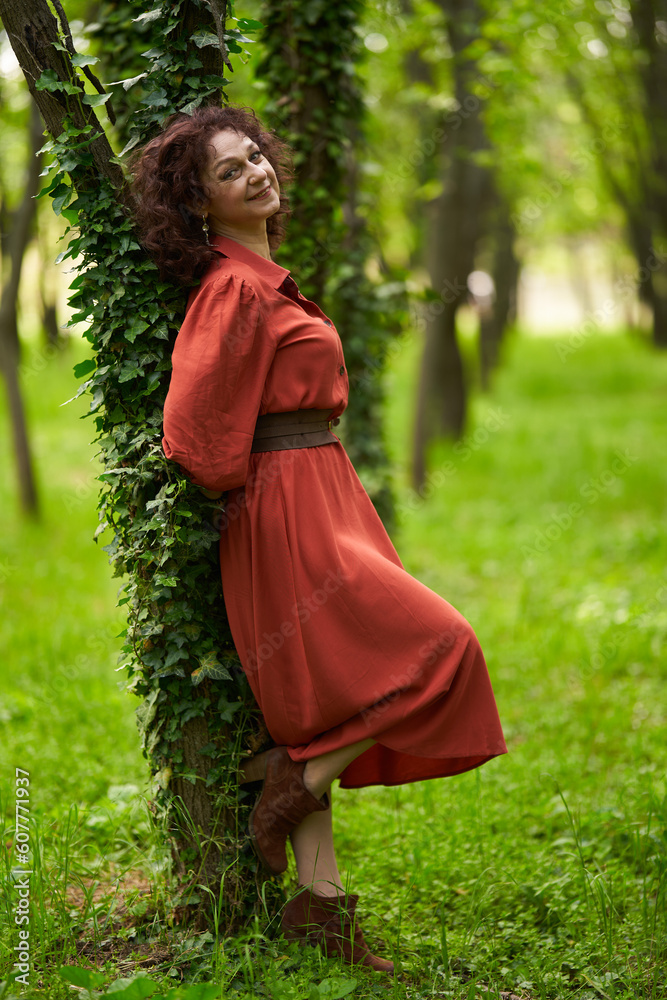 Candid of a mature curly hair redhead woman Candid of a mature curly hair redhead woman