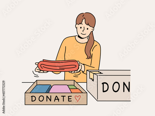 Smiling woman pack clothes in boxes to give for donation or charity. Kind happy girl donate apparel to needy poor people. Volunteering. Vector illustration. 