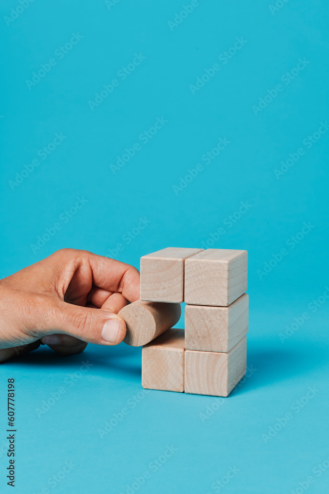 man plays with toy blocks man plays with toy blocks