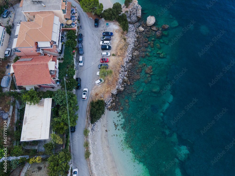overhead view car moving by road near sea Vasiliki town