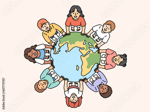 Smiling diverse children standing near globe showing unity and solidarity. Happy kids from around the world near planet earth. Ethnicity and diversity. Vector illustration. 