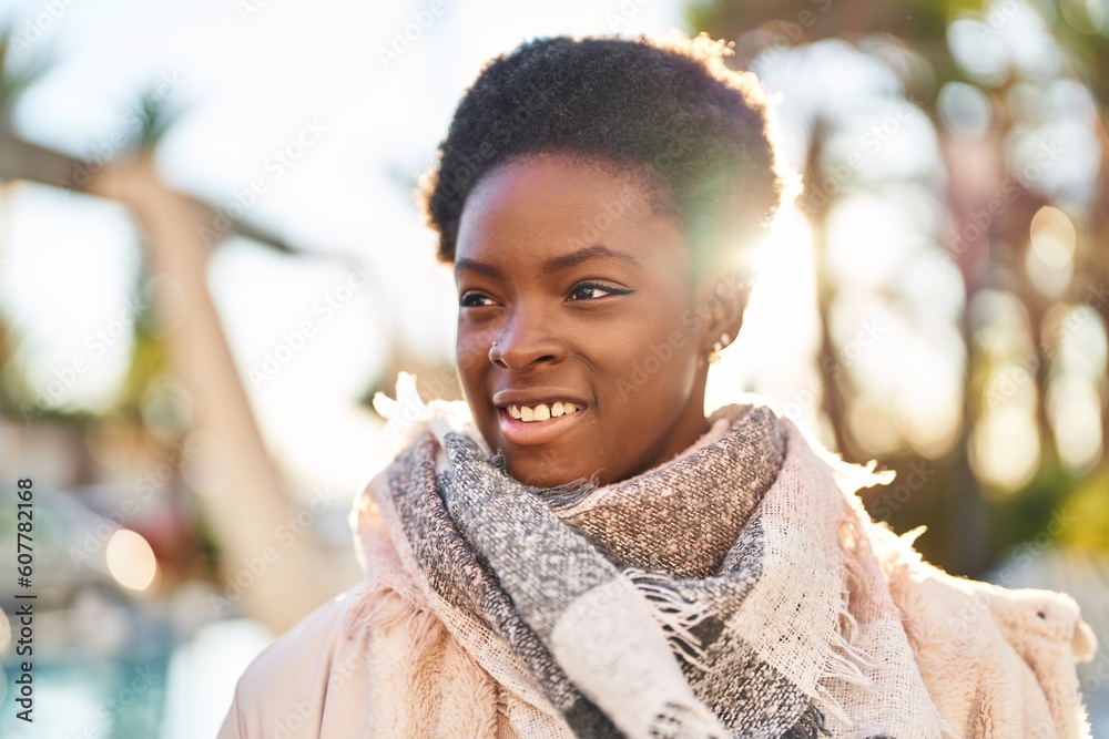African american woman smiling confident standing at park