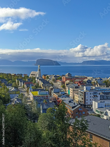 The view of Hammerfest town with Hammerfest church, surrounded by sea, mountains, and islands, Finnmark, Norway