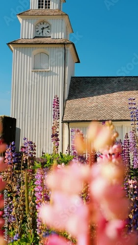 Tocksfors, Sweden. Tocksmarks Church In Sunny Summer Day. Local Landmark. Vertical Footage Video. Slow motion, Slow-mo Video. photo