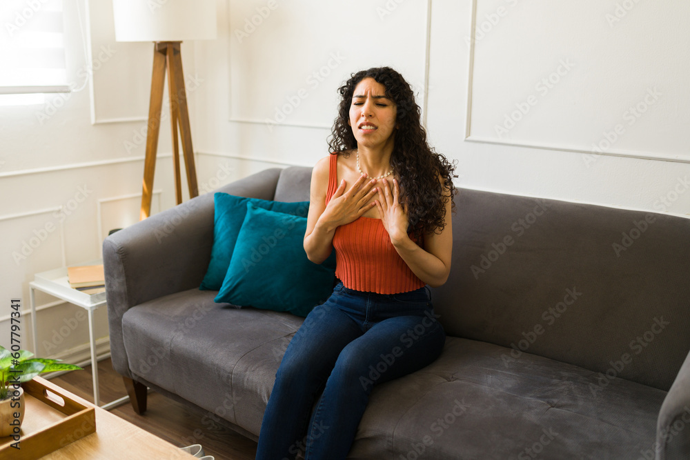 Mexican woman with tachycardia having an anxiety attack Mexican woman with tachycardia having an anxiety attack