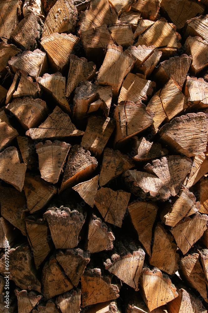 Pile of wood. Stack firewood. Texture. Chopped firewood. Splitting wood. Storage firewood.