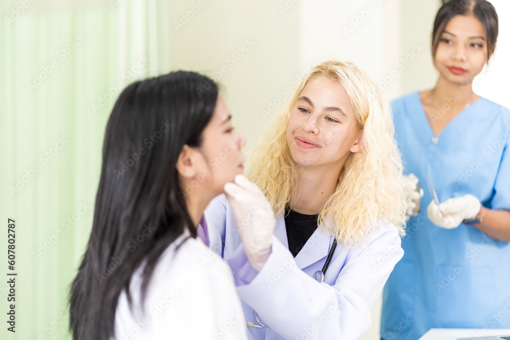 woman consulting about Cosmetic surgeon and make Botox injections on face for beauty procedures. Plastic surgery in face of woman woman consulting about Cosmetic surgeon and make Botox injections on face for beauty procedures. Plastic surgery in face of woman