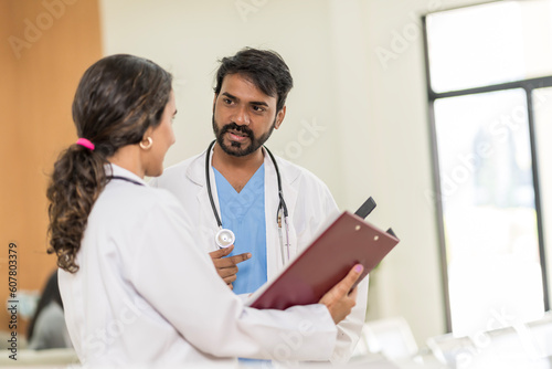 doctor in hospital Consulting the patient's test results