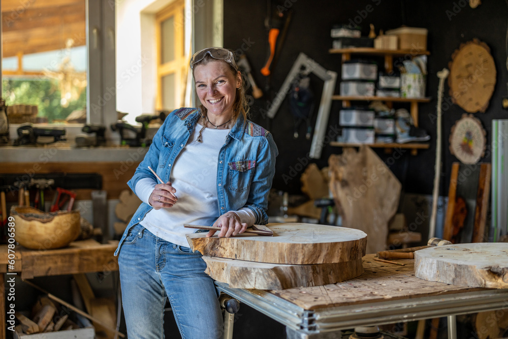 Portrait of confident craftswoman in her workshop
