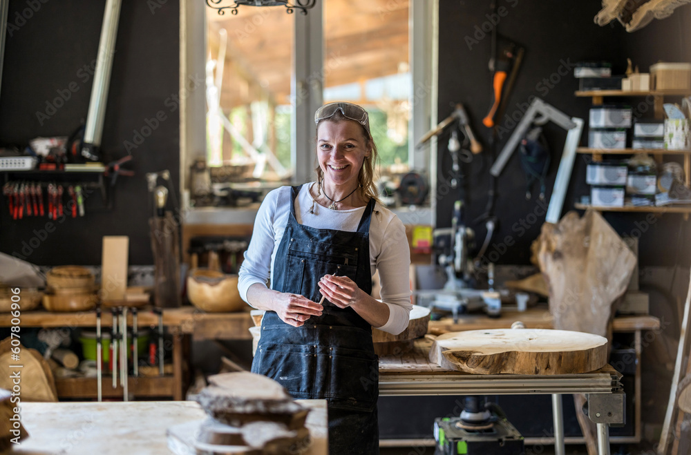 Portrait of confident craftswoman in her workshop
Portrait of confident craftswoman in her workshop