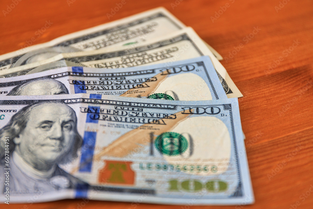 100 dollar bills on the table at home 100 dollar bills on the table at home