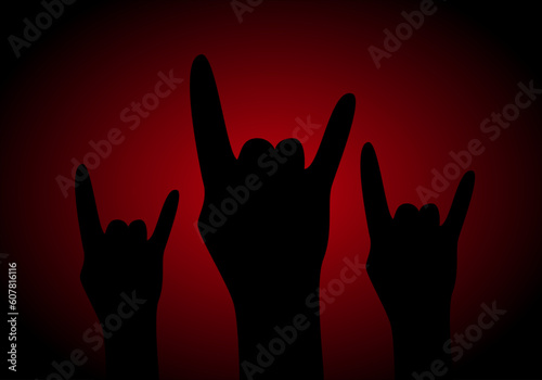 Concierto de rock y manos alzadas con el símbolo del rock sobre fondo degradado rojo negro. Día mundial del rock