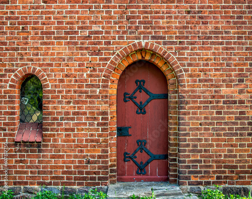 General view and close-up of architectural details of the St. Anthony of Padua Catholic Church built in 1911 in Sarnowo, Masuria, Poland.