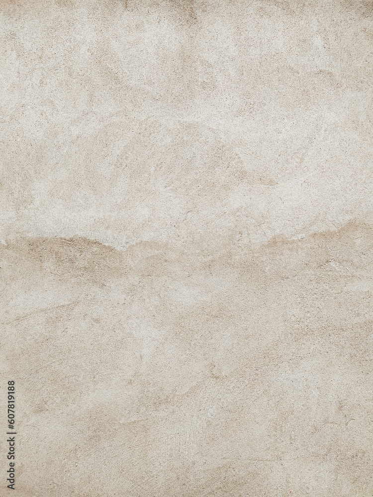 Naklejka premium An old beige cement wall background. Vertical orientation. Damaged concrete surface with detailed grunge texture.