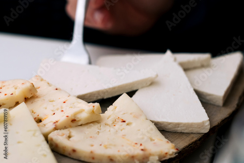 Typical Basilicata Italy cheese platter - caciocavallo podolico, buffalo mozzarella, pecorino and provolone
