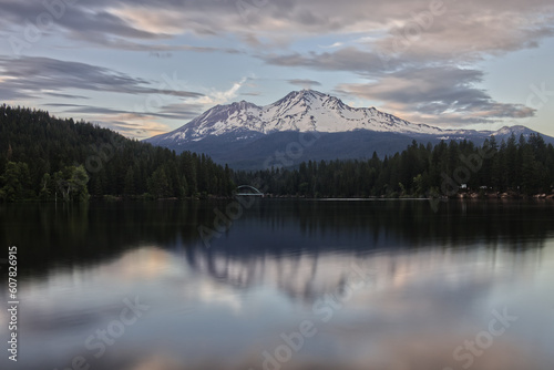 Snow Capped Mount Shasta Reflected in Lake Siskiyou on Cloudy Evening