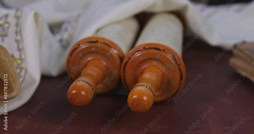An orthodox prayer shawl with tallit horn and shofar horn with symbol of Torah An orthodox prayer shawl with tallit horn and shofar horn with symbol of Torah