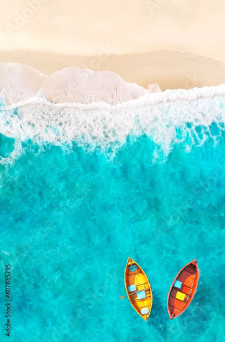 Aerial View of Sandy Tropical Beach and Ocean with Yellow and Red Boats Floating on Turquoise Water