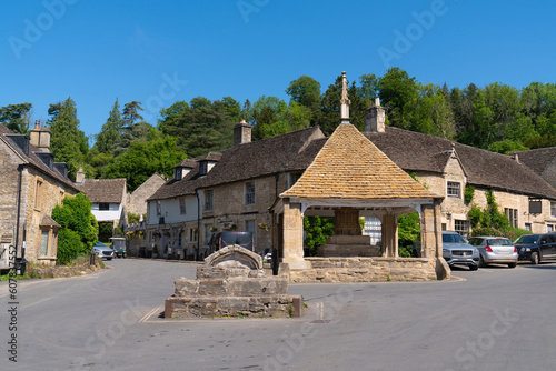 Castle Combe main square Wiltshire beautiful street within the Cotswolds Area of Natural Beauty near Chippenham England UK photo