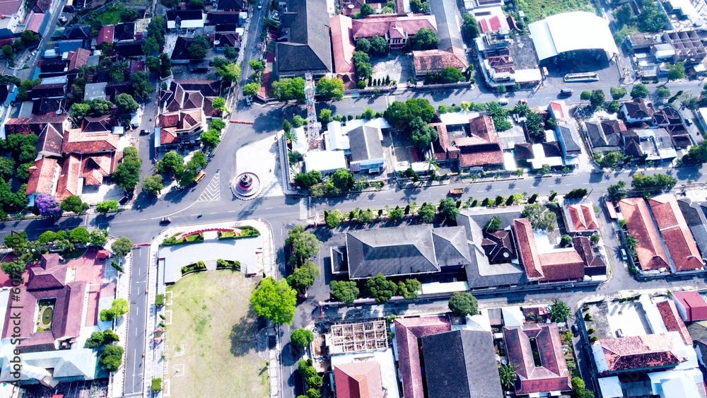 Fototapeta premium Aerial view of a still quiet small town in the morning