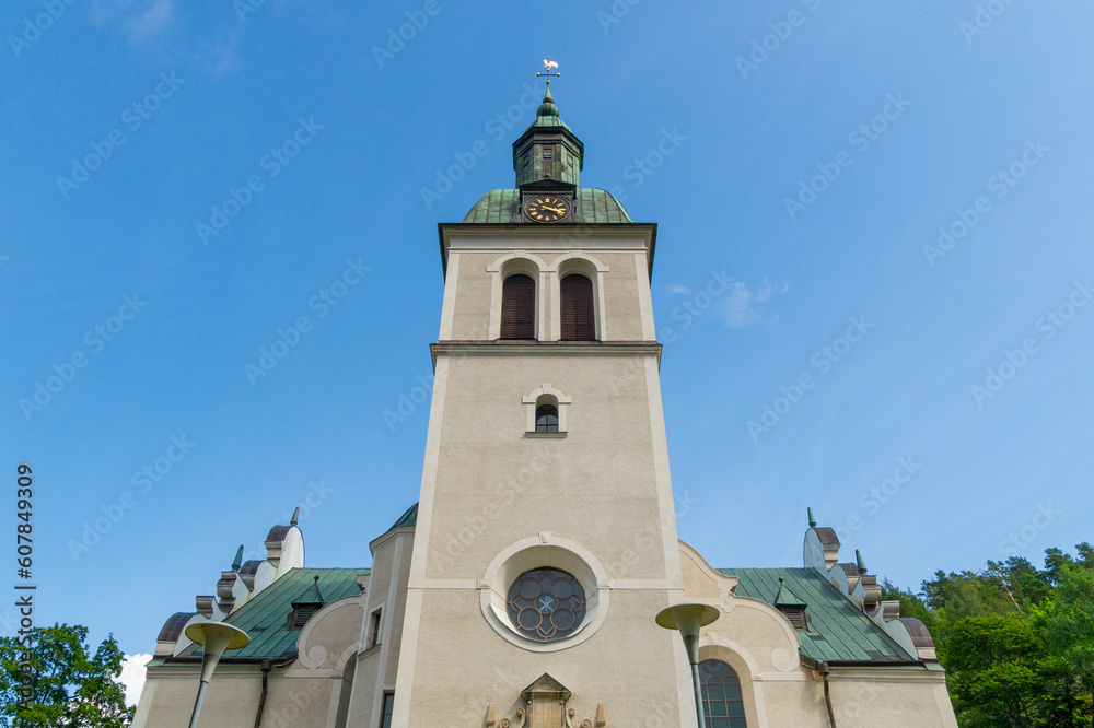 The church of gränna (Gränna kyrka) in Gränna, Sweden with the blue sky behind it. The church of gränna (Gränna kyrka) in Gränna, Sweden with the blue sky behind it.