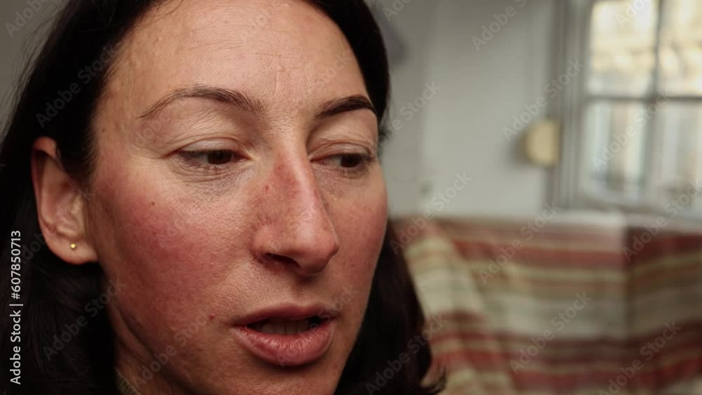 The master's hands make eyebrow correction for a brunette woman with a small plan at home. The master's hands make eyebrow correction for a brunette woman with a small plan at home.