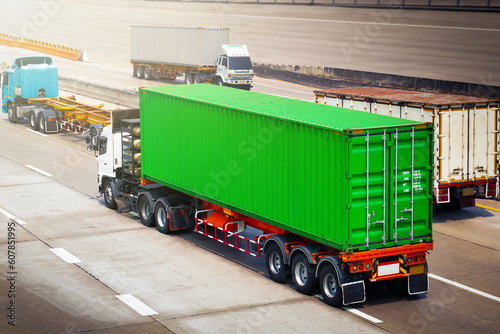 Semi Trailer Trucks Driving on Highway Road. Shipping Container Trucks. Commercial Trucks Transport. Delivery. Diesel Lorry Tractor. Freight Trucks Logistics Cargo Transport