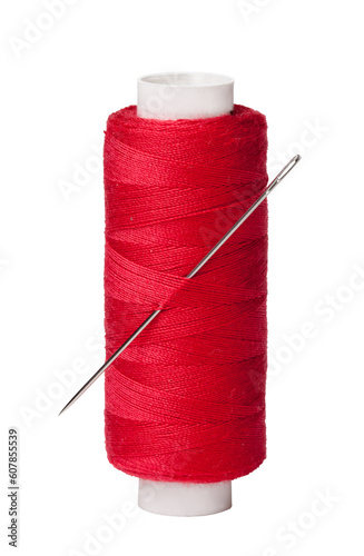 red bobbins of thread and needle on transparent background. png file