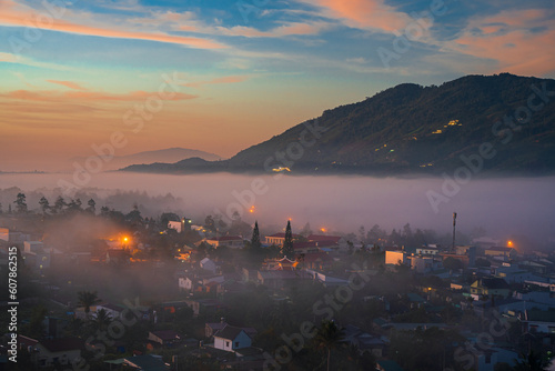 Mountains during dawn. Beautiful natural landscape in the summer time with fog