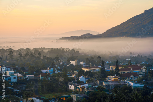 Mountains during dawn. Beautiful natural landscape in the summer time with fog