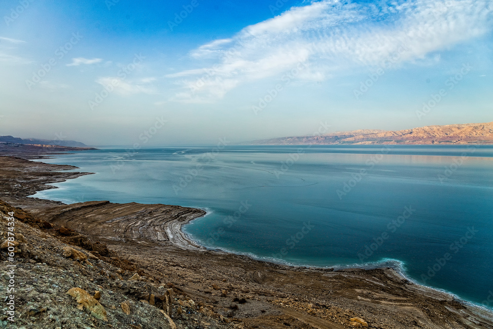 Beautiful View of Dead Sea coastline in Israel at sunset time. Jordan coast on the horizon.