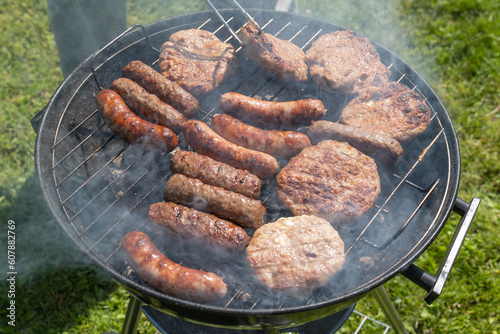 grilled sausages, chevapi and pljeskavice on the grill
