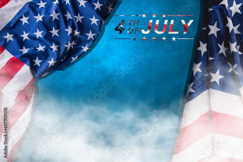 Independence Day. 4th of July. Lettering on a rustic wooden background with the American flag and fog.