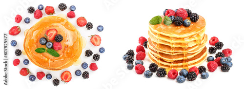 Pancakes stack with different berries isolated on white background. Top view. Flat lay