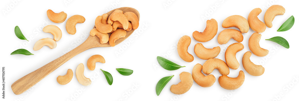 Roasted Cashew nuts in wooden spoon isolated on white background with full depth of field. Top view. Flat lay
