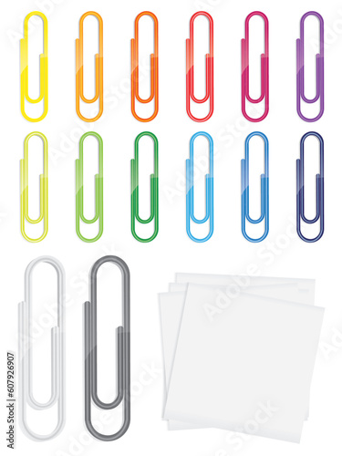 Many detailed glossy paperclips in various colors with blank notepapers