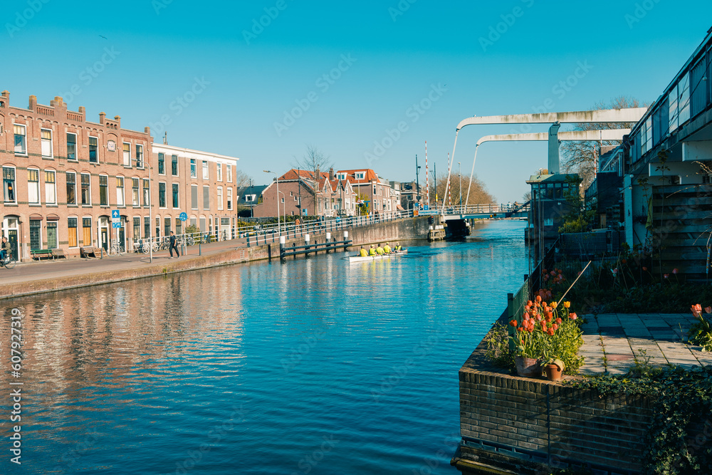 Canals and Brick Houses, Canoe Floats on the River in Delft, Netherlands