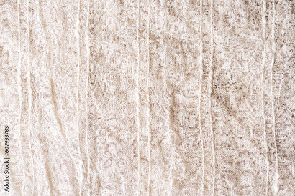 Beige cotton fabric with stripes. Texture, background Beige cotton fabric with stripes. Texture, background