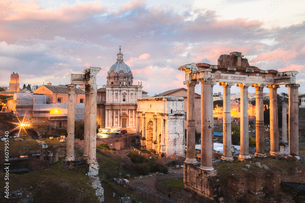 Sunset or sunrise view from Campidoglio and of the classical architecture of the ancient Roman Forum in Rome, Italy.