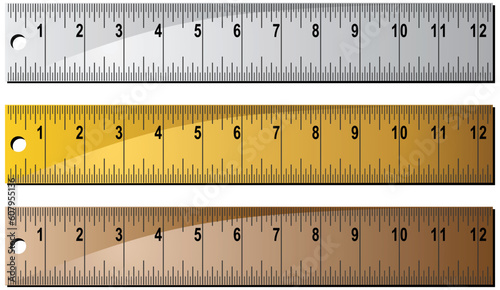 Set of 3 metal/wooden rulers with hole punch at end. Rulers measured in inches with centimeter dashes.