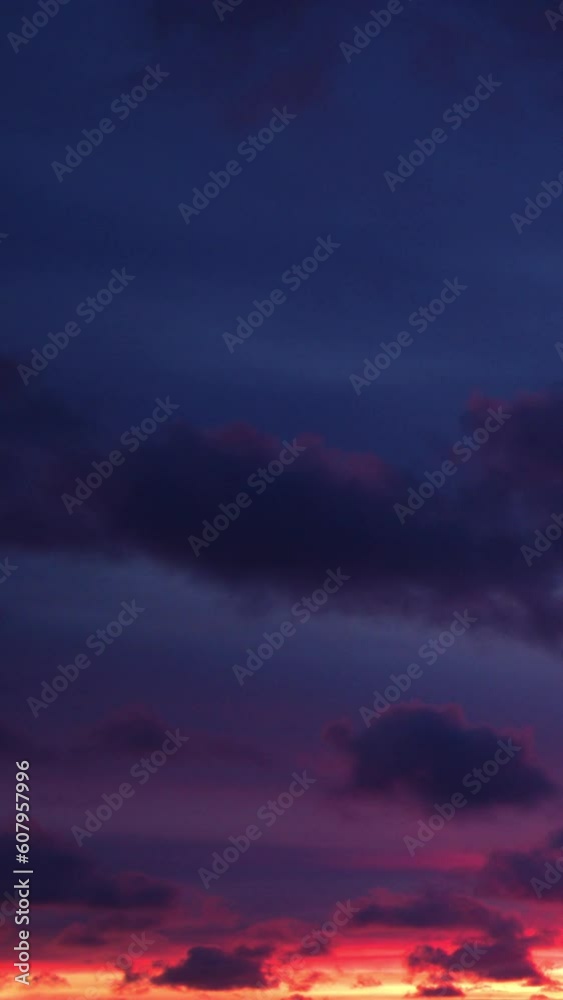 The dawn sky was a canvas of pink, with the fluffy clouds adding depth and texture to the beautiful display. Vertical video. The dawn sky was a canvas of pink, with the fluffy clouds adding depth and texture to the beautiful display. Vertical video.