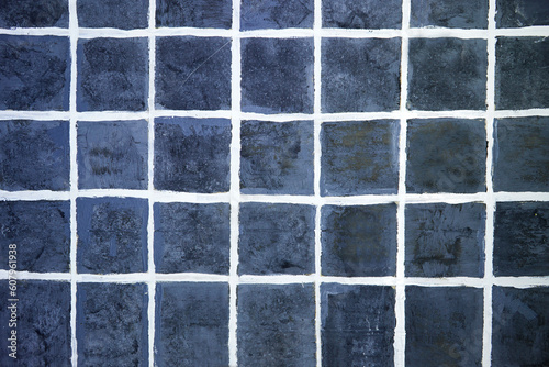 painted blue tiles background. seamless texture square light