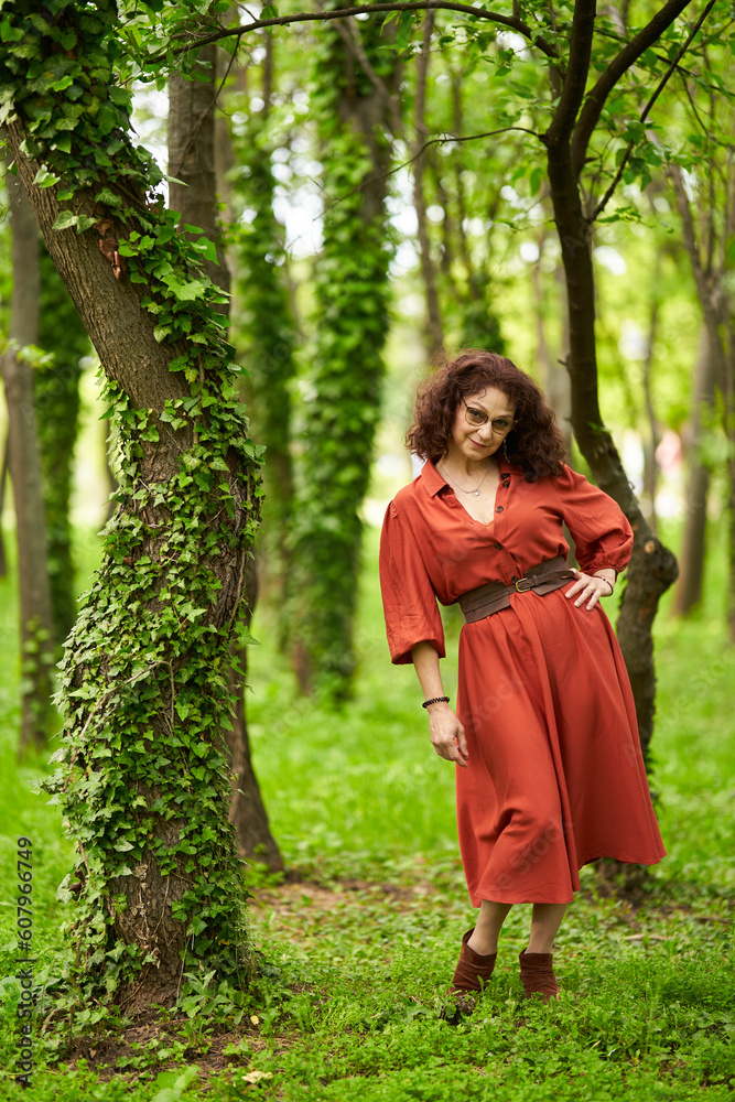 Candid of a mature curly hair redhead woman