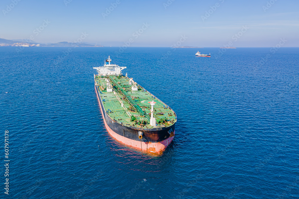 Aerial view of a crude oil tanker waiting for uploading near a sea port at the anchorage