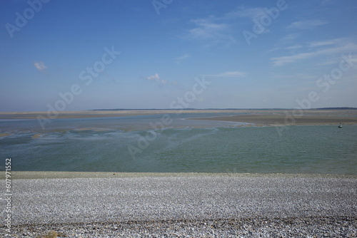 Sea and pebbles on the Baie de Somme, France