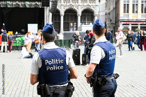 Police patrolling on main square in Brussels. Belgian police officers on the street. Grand Place.