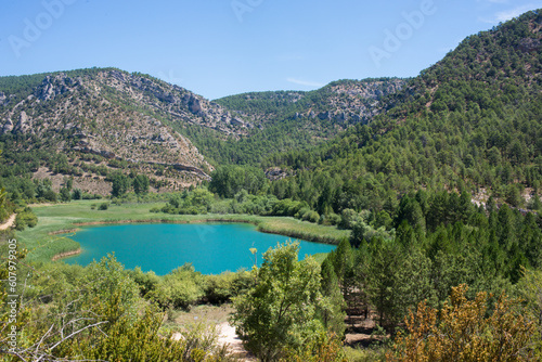 Beautiful landscape with mountains forest, and turquoise lake. Guadalajara, Spain