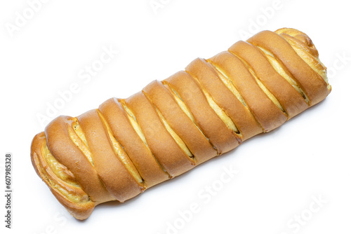 Dessert swirled golden color pastry roll filled isolated on white background
