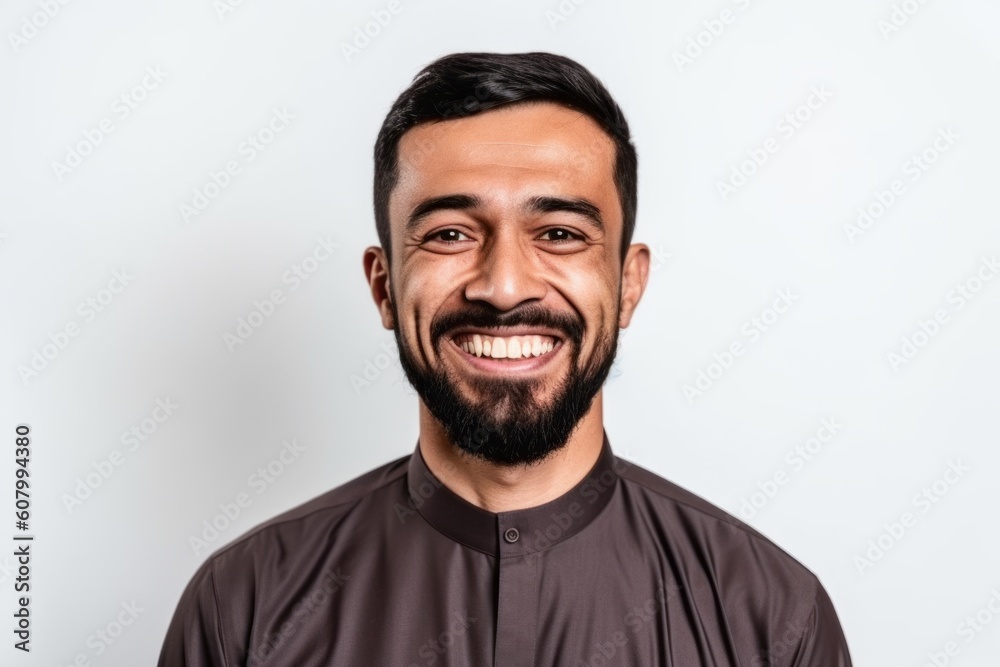 Portrait of a happy young man smiling isolated on a white background Portrait of a happy young man smiling isolated on a white background