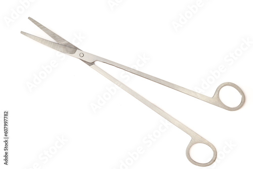 Long metal medical scissors isolated on white background
